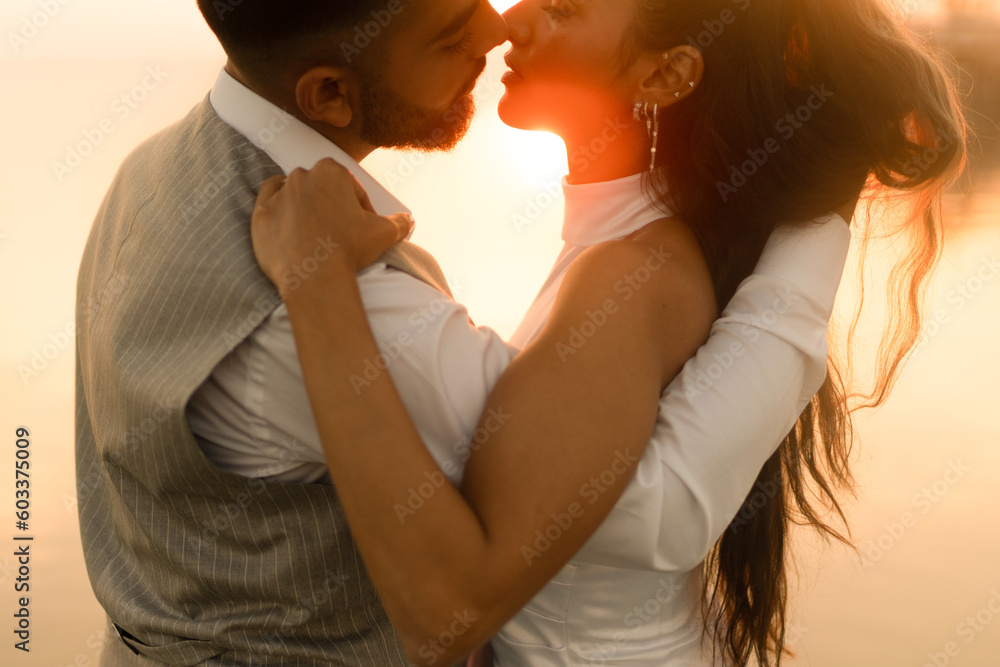 Lovers before kissing at the sunset Lovers before kissing at the sunset