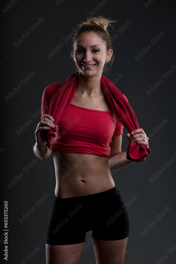 Confident, determined young woman at fitness club Confident, determined young woman at fitness club