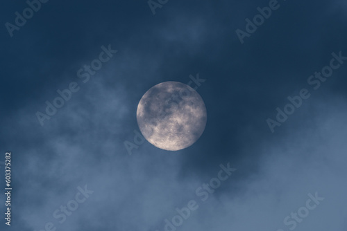 Full moon with dark clouds