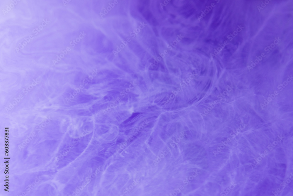 Fototapeta premium Ink water mist motion.Paint water drop. Neon purple blue fume moving on abstract blurred defocused background.