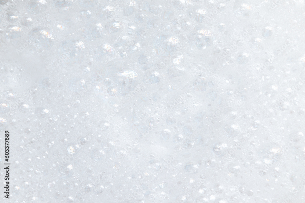 Soap bubbles.Abstract background white soapy foam texture.Shampoo foam with bubbles.Indoors shot. Soap bubbles.Abstract background white soapy foam texture.Shampoo foam with bubbles.Indoors shot.