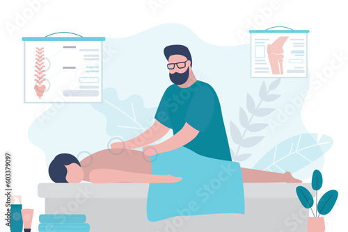 Relaxed woman getting back massage in spa with professional massage therapist. Wellness, healing and relaxation concept. Young adult lying and male masseur massaging her body.