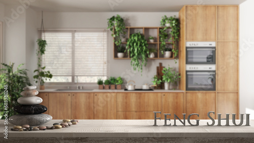 Wooden vintage table shelf with pebble balance and 3d letters making the word feng shui over sustainable kitchen with appliances and houseplants, urban jungle interior design © ArchiVIZ