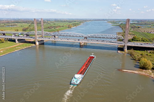 Aerial from a freighter on the river Waal at the Martinus Nijhof bridge near Zaltbommel in the Netherlands photo