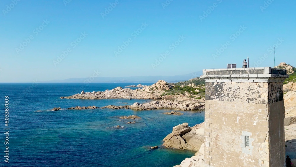 A Majestic Aerial Perspective of the Capu di Fenu Lighthouse, Standing Sentinel over the Rugged Beauty of Bonifacio's Coastline, Corsica