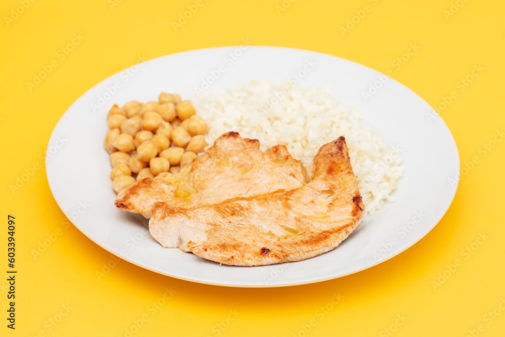 grilled chicken with chick-peas and boiled rice grilled chicken with chick-peas and boiled rice