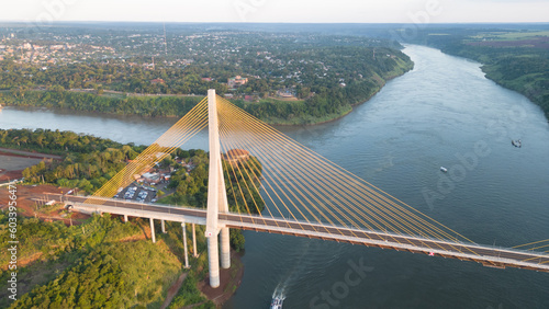 Aerial Drone Fly Above Bridge Connection in Triple Frontier, Brazil Paraguay and Argentina Junction Area, Parana and Iguazu Rivers photo