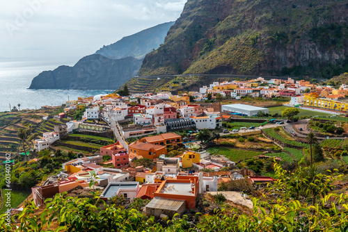 View of the town of Agulo between the valleys and municipalities of Hermigua and Vallehermoso in La Gomera, Canary Islands photo