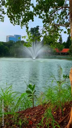 Footage of a fountain in the artificial lake at Senayan Park Mall, Jakarta photo