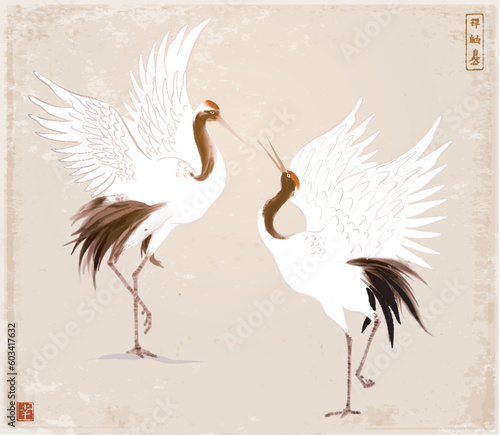 Two dancing crane birds on vintage background. Traditional oriental ink painting sumi-e, u-sin, go-hua. Hieroglyphs - zen, freedom, nature, happiness