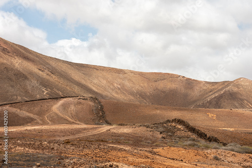 Typical Lanzarote landscape. View on Montana de Tinaguache volcano near Costa Teguise. Canary Islands. 