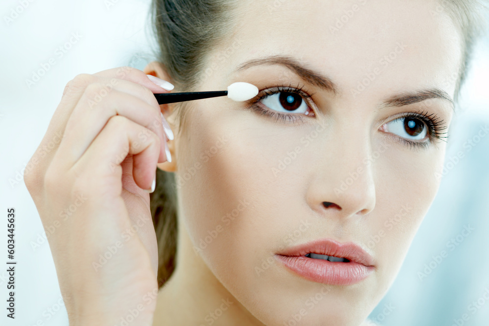 Portrait of Beautiful brunette woman doing daily morning routines (the make up series 2) Portrait of Beautiful brunette woman doing daily morning routines (the make up series 2)