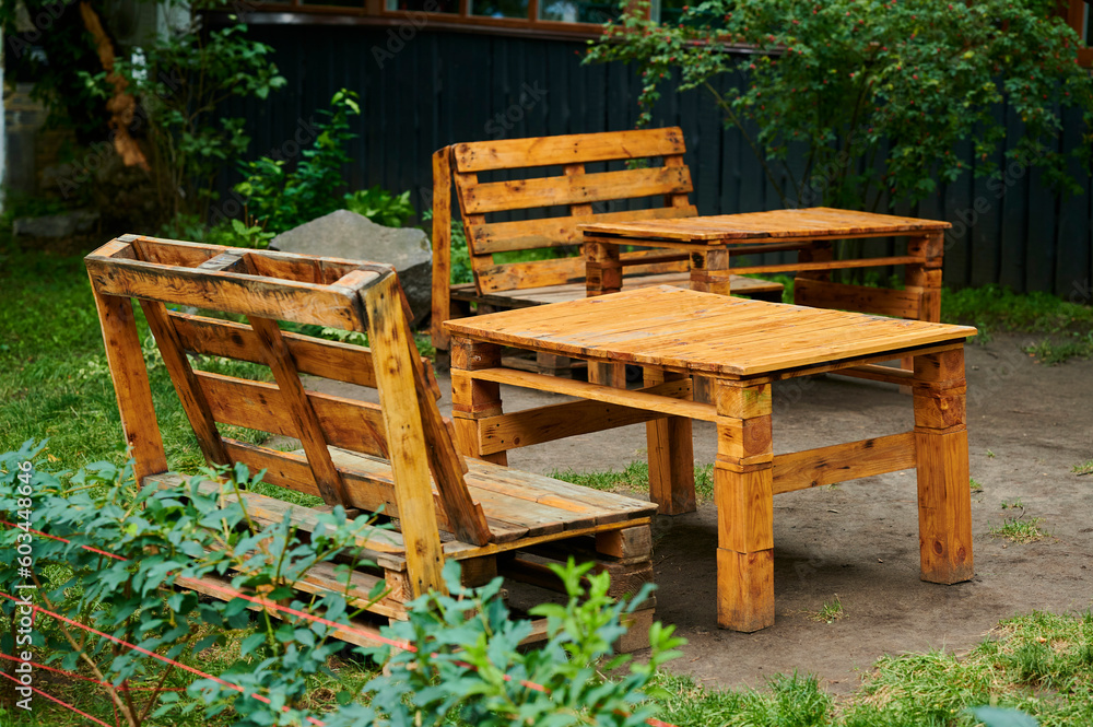 furniture from construction pallets in an outdoor terrace cafe