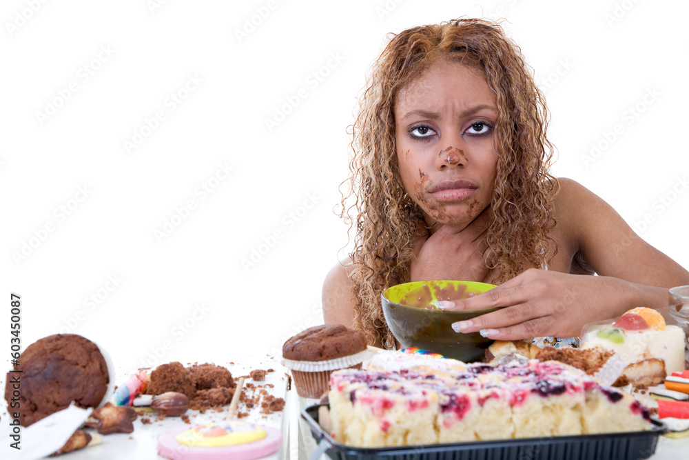 Pretty black girl feeling very ill after having eaten too much sweets Pretty black girl feeling very ill after having eaten too much sweets