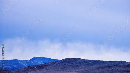 Mountains with clouds in the sky © Allen Penton