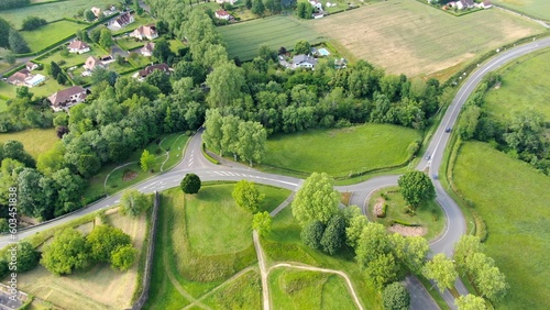 Aerial view of a road traffic junction with its surrounding countryside © Aqui Drone