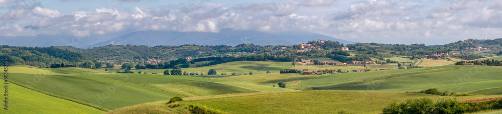 Panoramic view of the Tuscan countryside in spring in the province of Pisa, between Orciano Pisano and Lorenzana, Italy