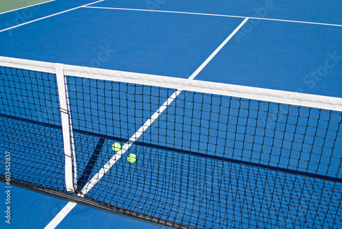 Resort tennis club and tennis courts with balls