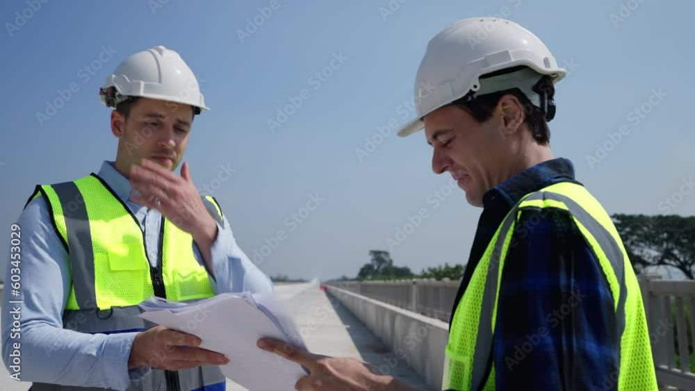 Team foreman working on construction site. He planing about construction project together. Team foreman working on construction site. He planing about construction project together.