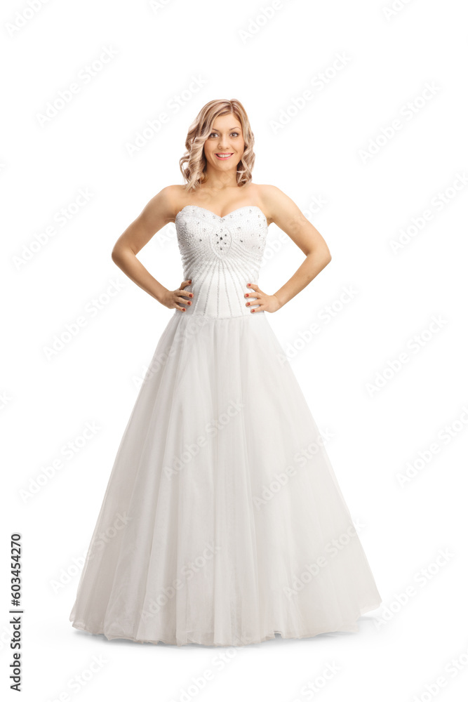 Beautiful bride trying on a wedding dress