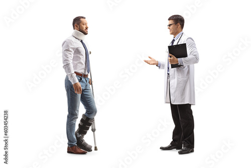 Doctor talking to an injured male man with an orthopedic boot and cervical collar