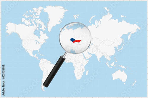 Magnifying glass showing a map of Czech Republic on a world map.