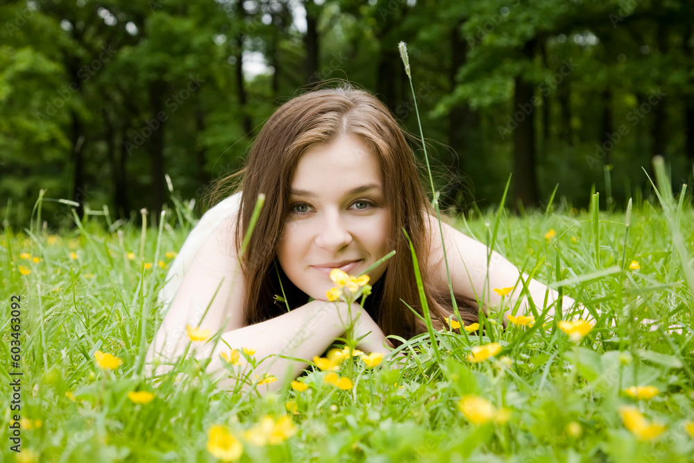 Relaxing. Young Woman Laying On Grass. Relaxing. Young Woman Laying On Grass.