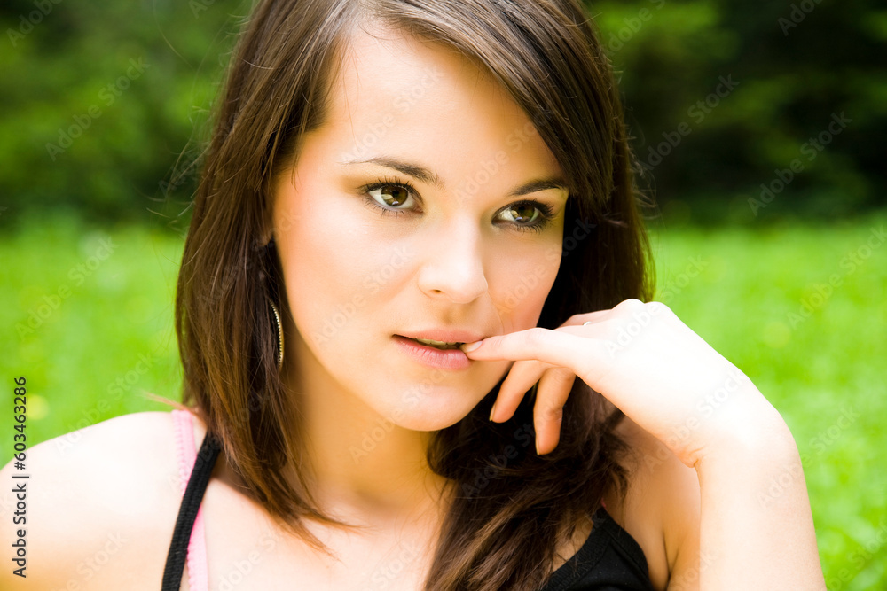 Beautiful young woman dreaming outdoors. Copy space. Beautiful young woman dreaming outdoors. Copy space.