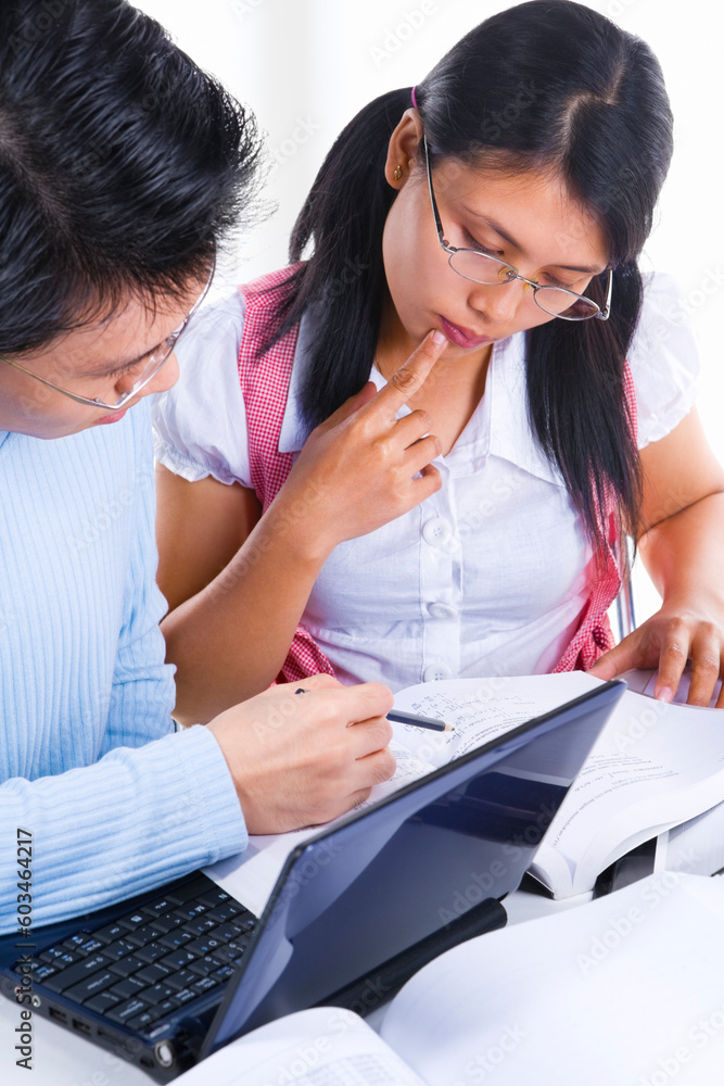 Two scholars is studying in class and discussing on mathematics. Two scholars is studying in class and discussing on mathematics.