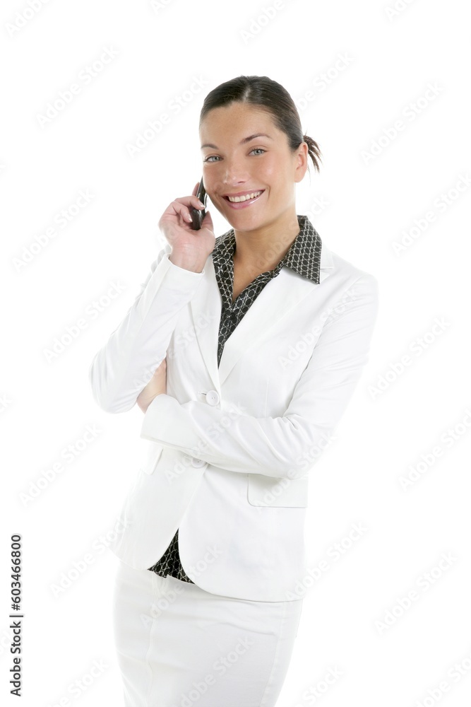 Beautiful businesswoman talking mobile phone over white Beautiful businesswoman talking mobile phone over white