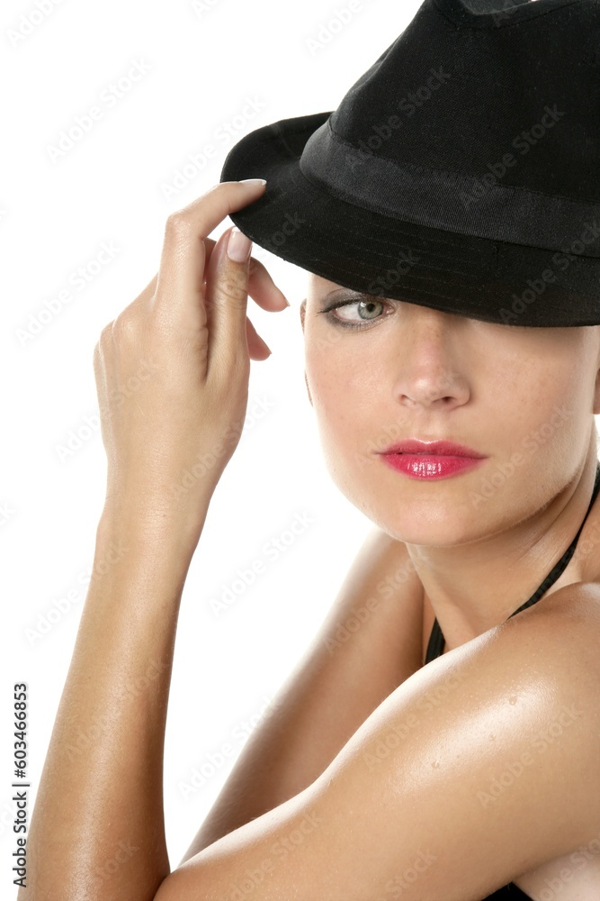 Beautiful red lips woman portrait, black hat on studio white background Beautiful red lips woman portrait, black hat on studio white background