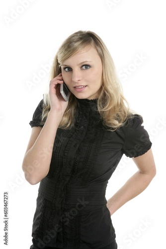Blond beautiful woman talking with mobile phone, isolated on white
