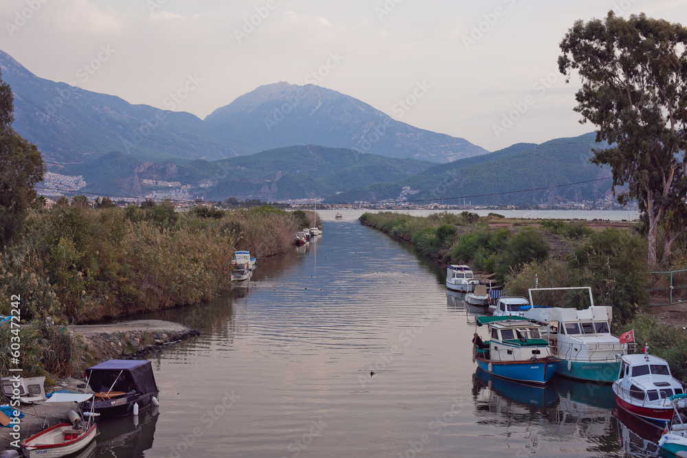 View of the mountains and the long river in the evening