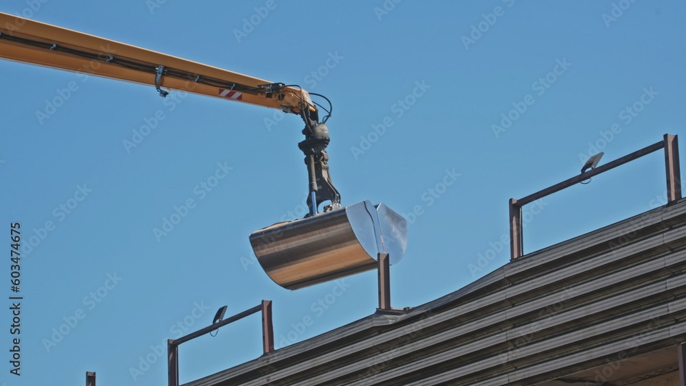 Port Crane with Scoop Loading Freight Ship with Wheat Port Crane with Scoop Loading Freight Ship with Wheat