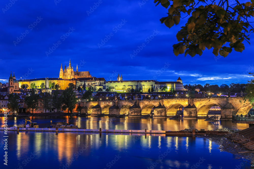 Prague Czech Republic - May 13. 2023: Praque Castle and the charles bridge with illumination during early evening blue hour