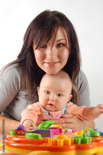 attractive brunette woman with baby girl