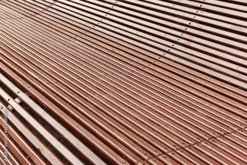 Bent wooden park bench construction. Abstract architecture photo
