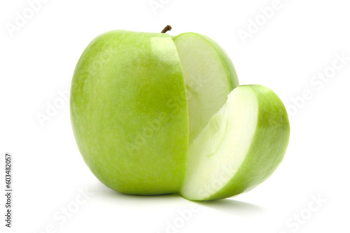 Sliced green ripe apple isolated on white background
