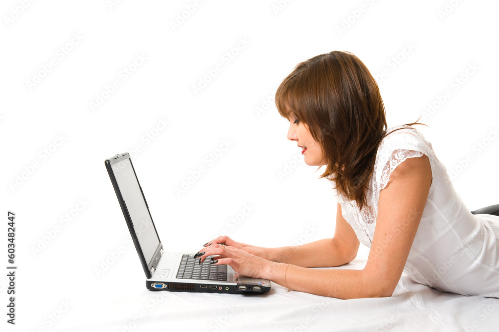 Young japanese businesswoman with laptop lying on the floor. Isolated Young japanese businesswoman with laptop lying on the floor. Isolated