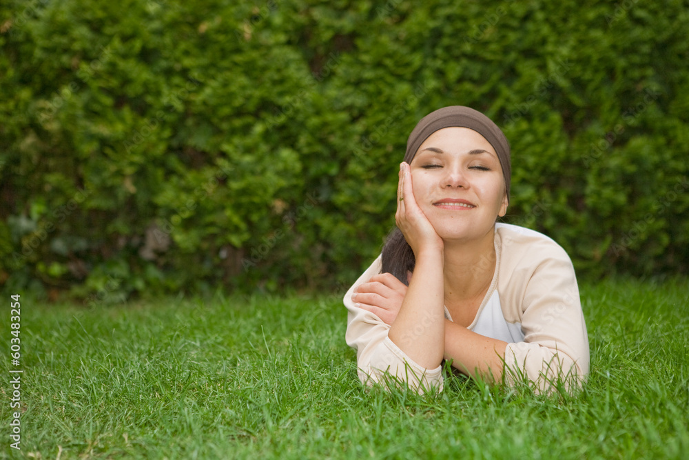 attractive woman on green grass attractive woman on green grass