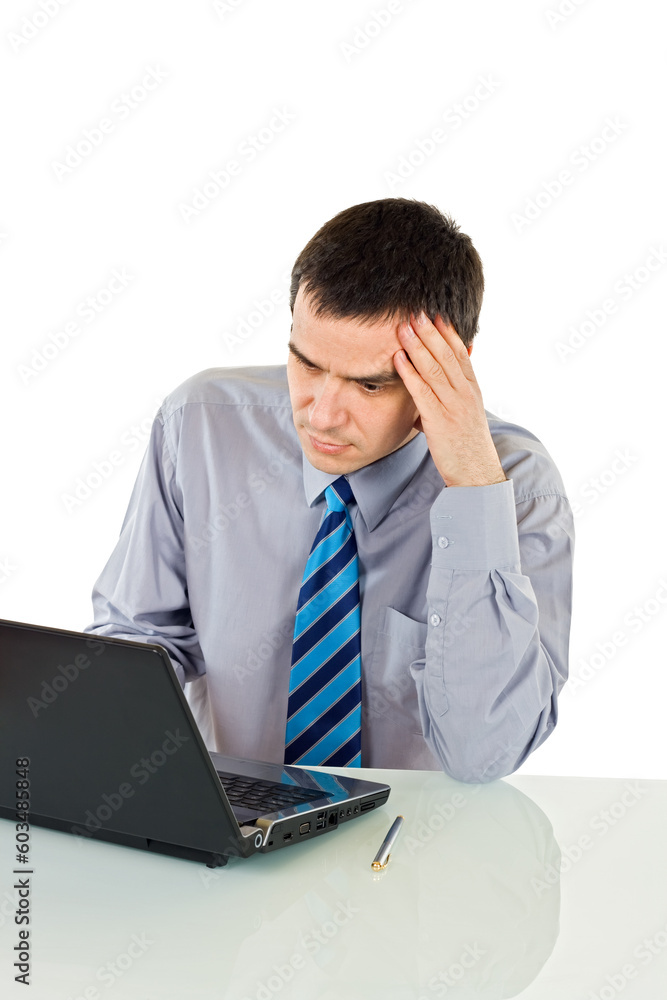 Young businessman thinking and looking seriously the screen - isolated Young businessman thinking and looking seriously the screen - isolated