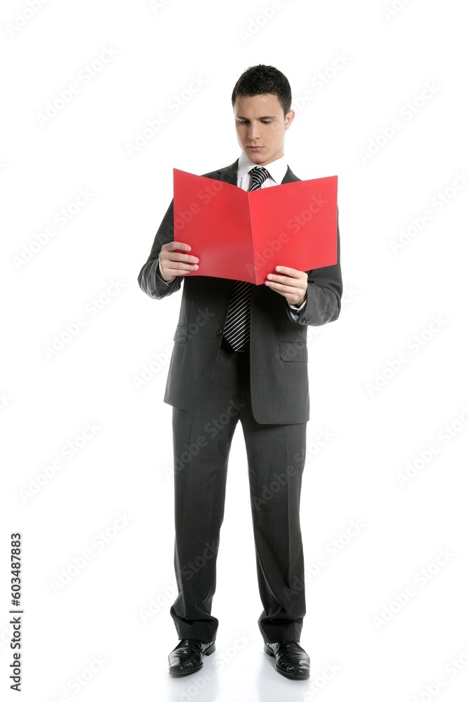 Full body businessman reading red folder isolated on white at studio Full body businessman reading red folder isolated on white at studio