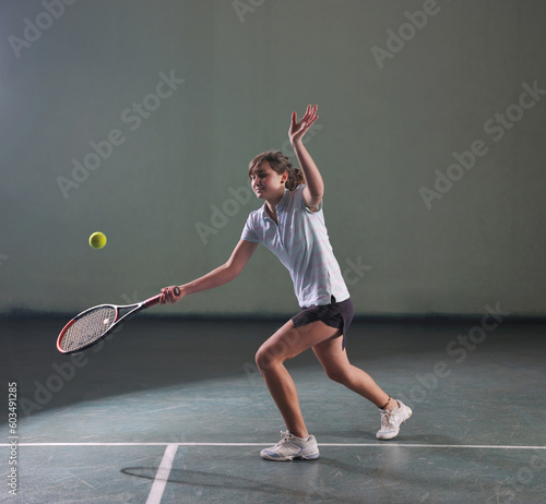 young girl exercise tennis sport indoor © Designpics