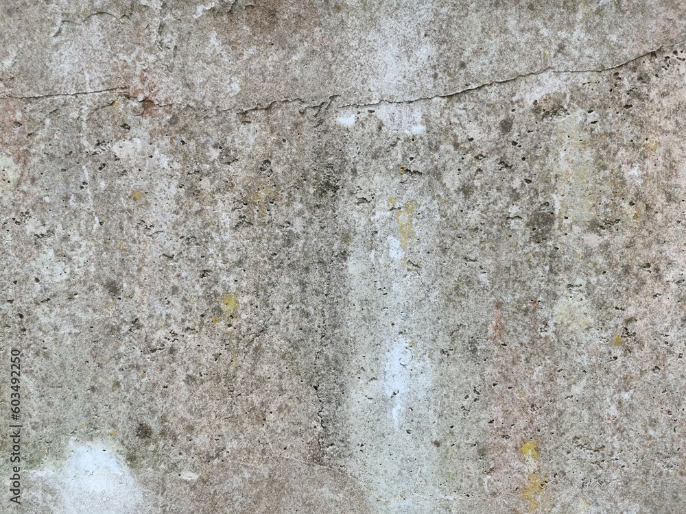 The grunge texture is an old gray concrete wall. The grunge texture is an old gray concrete wall.