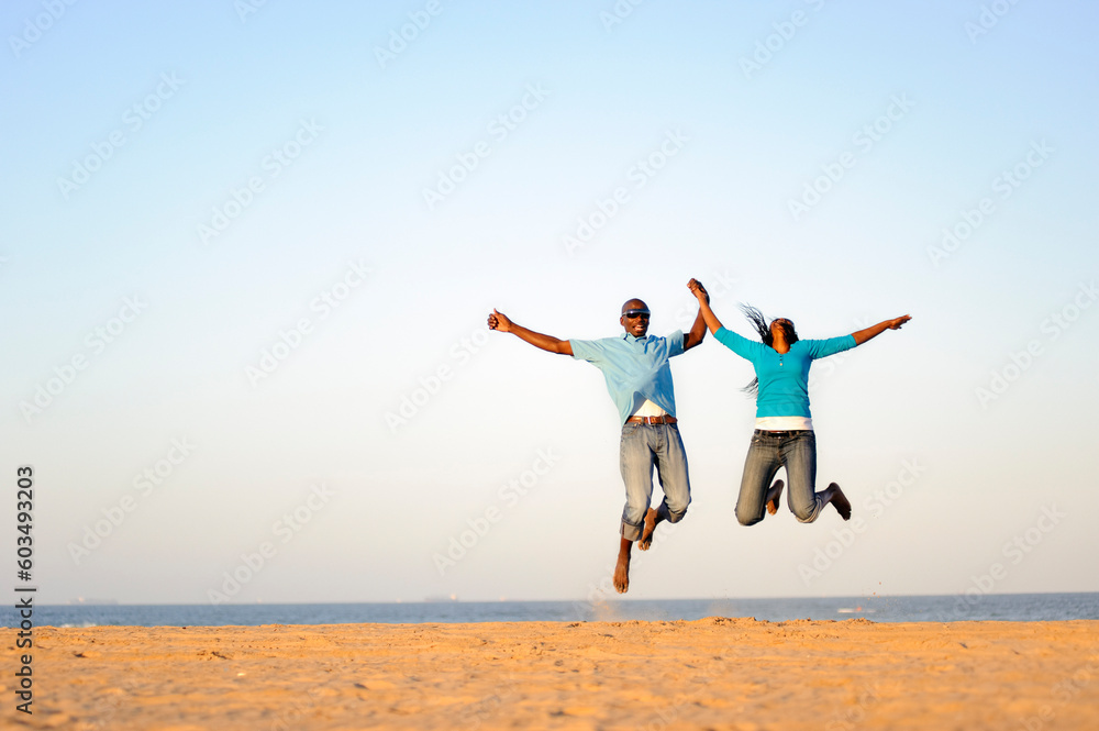 African American couple having fun at the beach African American couple having fun at the beach