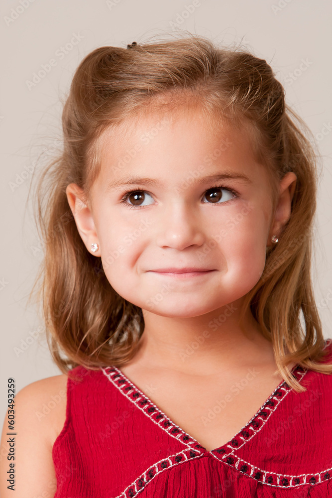 Portrait of pretty little girl wearing red dress Portrait of pretty little girl wearing red dress