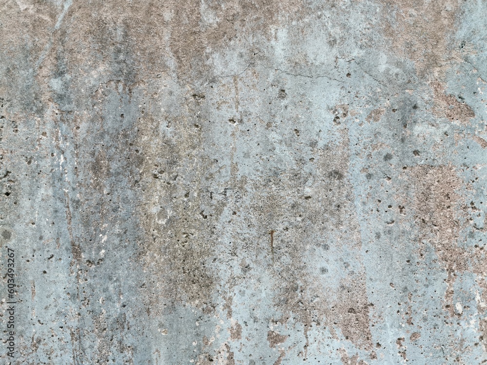 The grunge texture is an old gray concrete wall. The grunge texture is an old gray concrete wall.