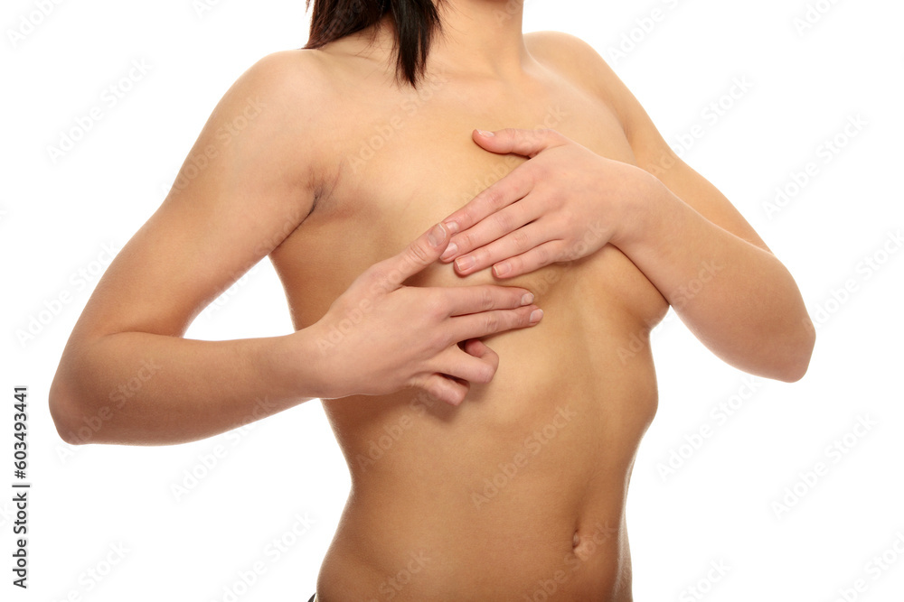 Breast cancer exam - Woman holding her breast Breast cancer exam - Woman holding her breast