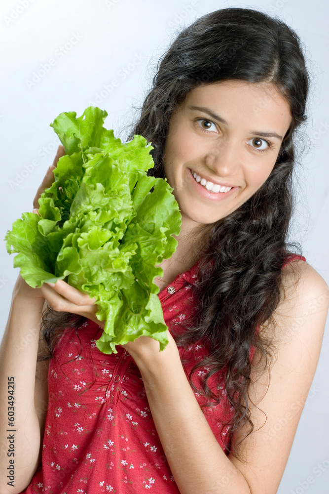 girl holding fresh lettuce girl holding fresh lettuce