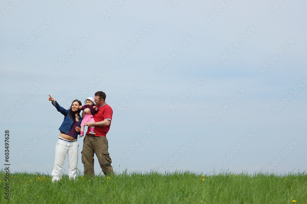 happy family together on green meadow happy family together on green meadow
